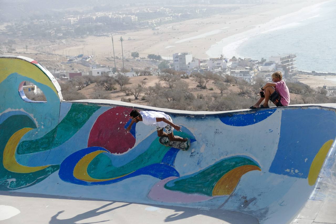 Skateboarding at Taghazout skatepark with ocean view