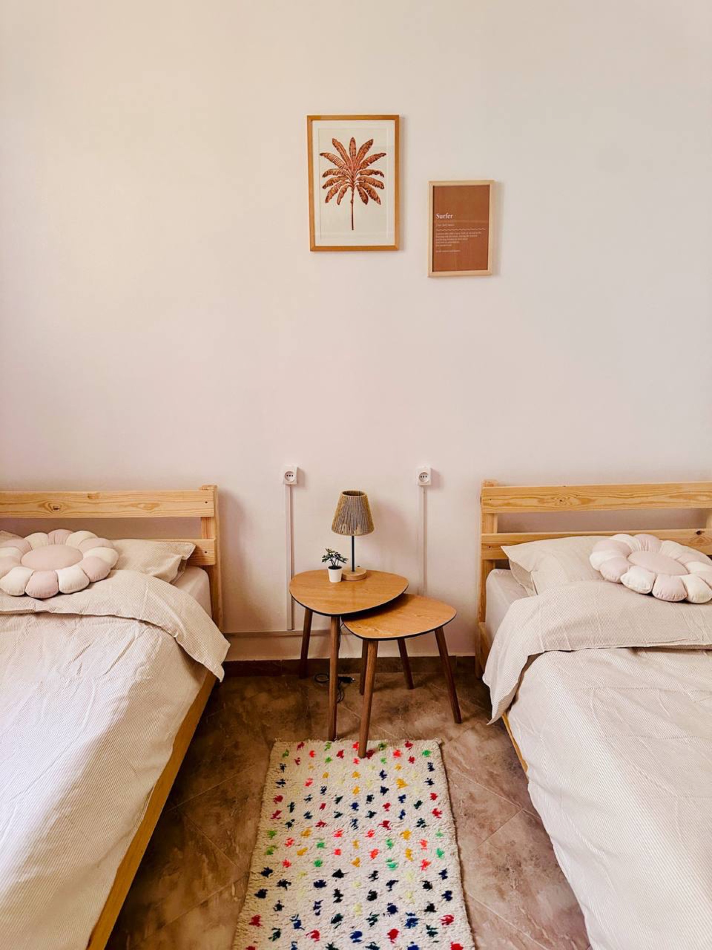 Cozy twin room with Moroccan rug