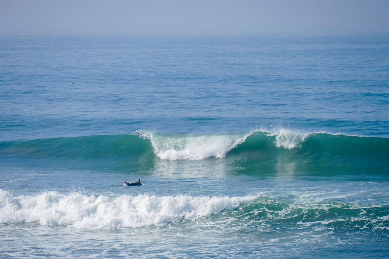 Clean peeling set rolling through Banana Beach in Aourir